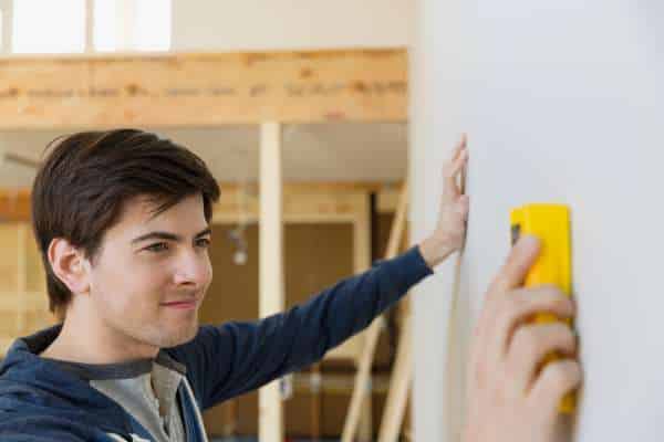 Use Stud Finder For Secure Installation to hang shutterfly mounted wall art