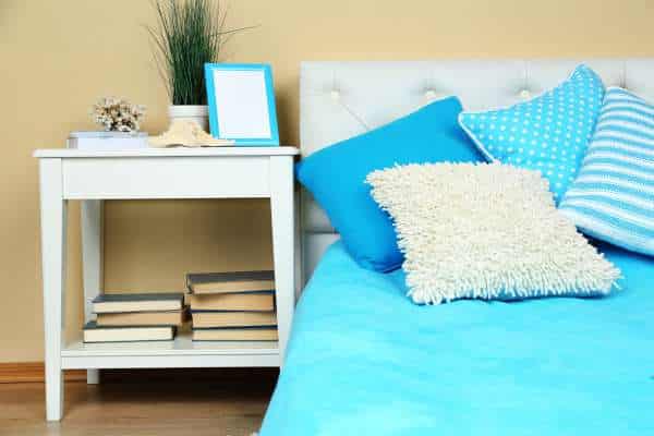 Display Books And Magazines decorate nightstands without lamps